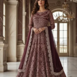 Sairiwardrobe Ready to Wear Maroon Maxi in premium Bareeze Net featuring intricate silver and tonal embroidery. This 3-piece Pakistani festive outfit includes a long-sleeve flared maxi with a matching scalloped-edge dupatta, modeled in a luxury palace setting.